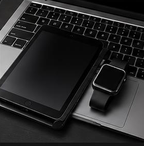 Laptop, tablet and smartwatch protected with equipment films