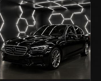 Black luxury sedan with a full body Forever Young PPF kit