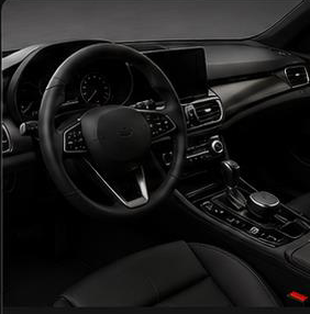 Car interior with dashboard and trim protected by interior films